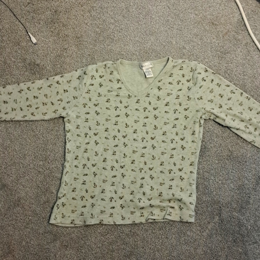 A green with flower mid length sleeves